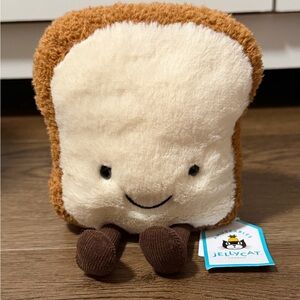 Jellycat Smiling Toast Plush in Brown and Cream